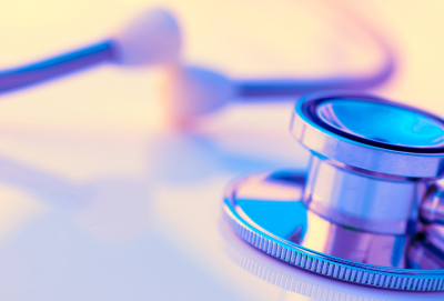 Close-up of a stethoscope on a desk. (source: Getty Images)