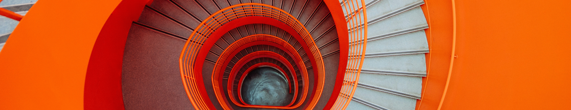 Gray and orange spiral stairs (credit: Getty Images)