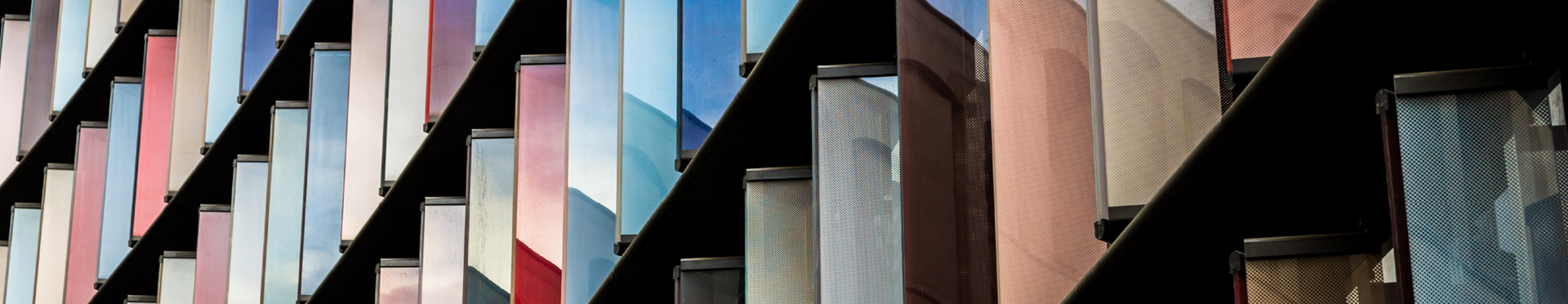 Multi colored facade of modern architecture in a global city (credit: Getty Images)