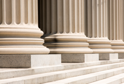 Column architecture, close-up on column base and marble stairs (source: Getty Images)